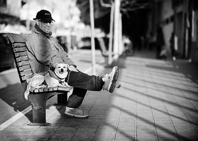 Man doing up his LED high top running shoes